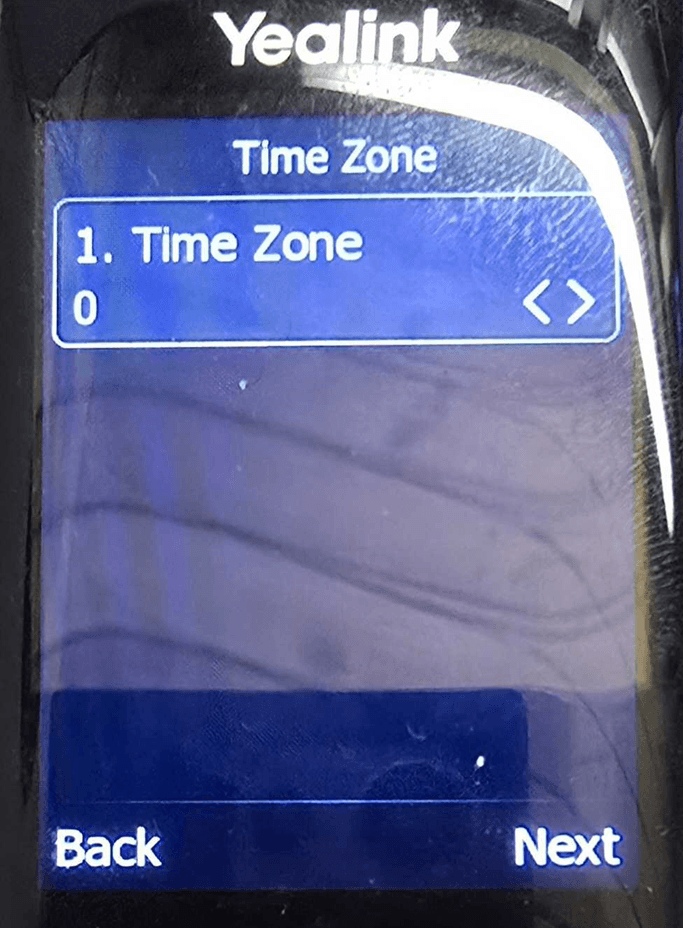 Time Zone screen with a Time Zone value and left and right arrows, with Back and Next buttons