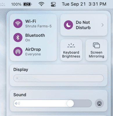 macOS Control Center showing Wi-Fi, Bluetooth, AirDrop, a Do Not Disturb tile, and Display and Sound sliders