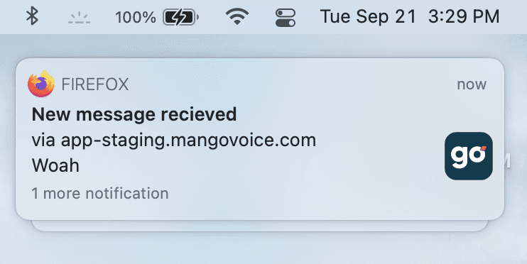 A macOS Firefox banner notification reading 'New message received via app-staging.mangovoice.com' in the top-right of the screen